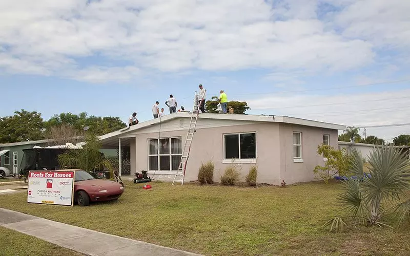 A team of Florida Southern Roofing roofers working on Mr. Bostic's roof.