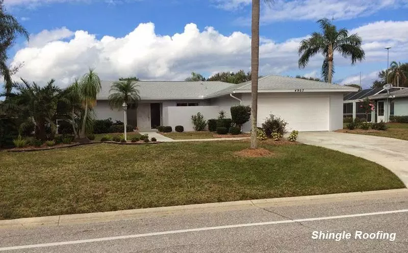 Residential shingle roof  by Florida Southern Roofing.
